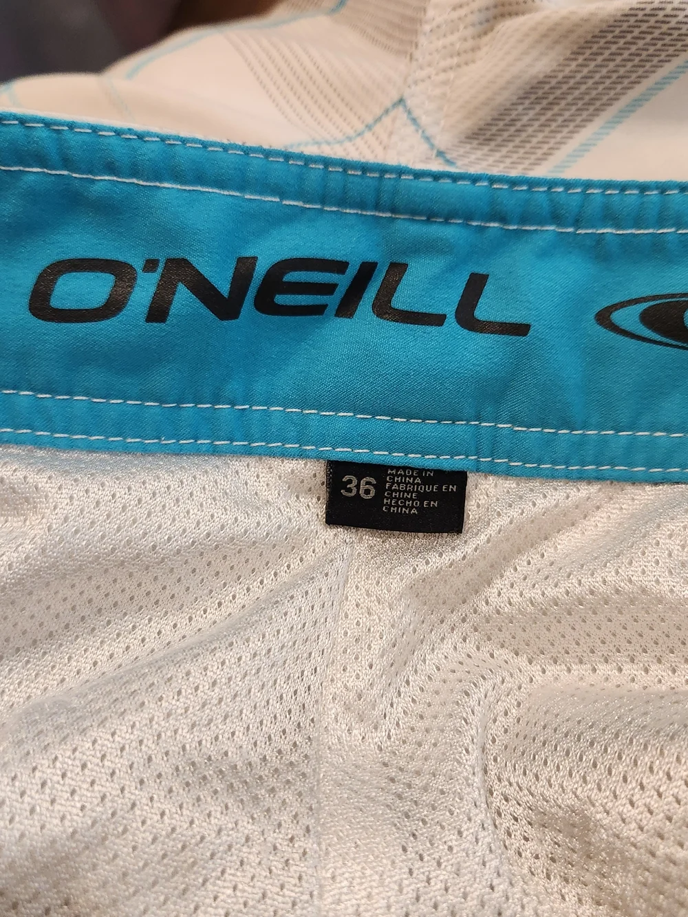 O'neill plaid board shorts men size 36 gray white turquoise swin trunks